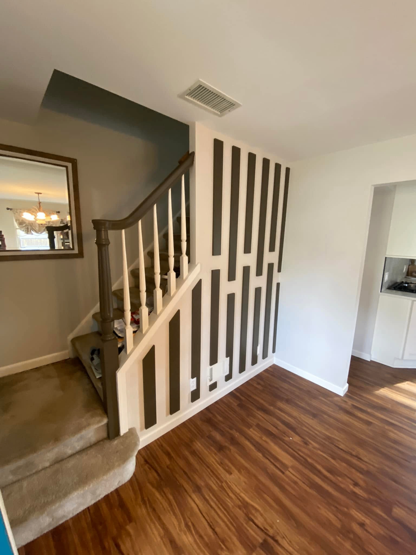 Interior staircase and accent wall in a Pompton Lakes home